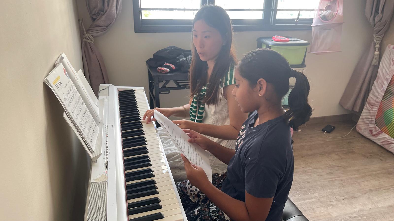 Anjali playing piano